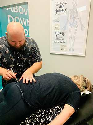 Chiropractor Greenville SC Zane Gray Adjusting Pregnant Woman